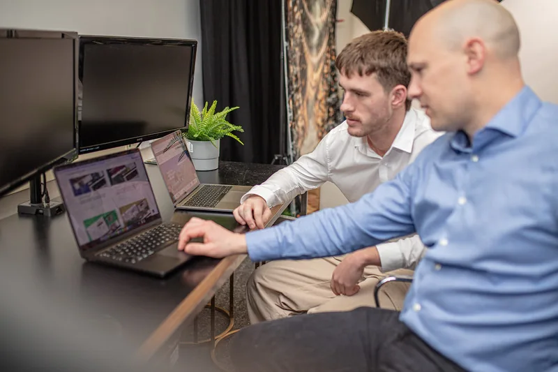 David and Luke from Halizona reviewing a client website at the Halizona office
