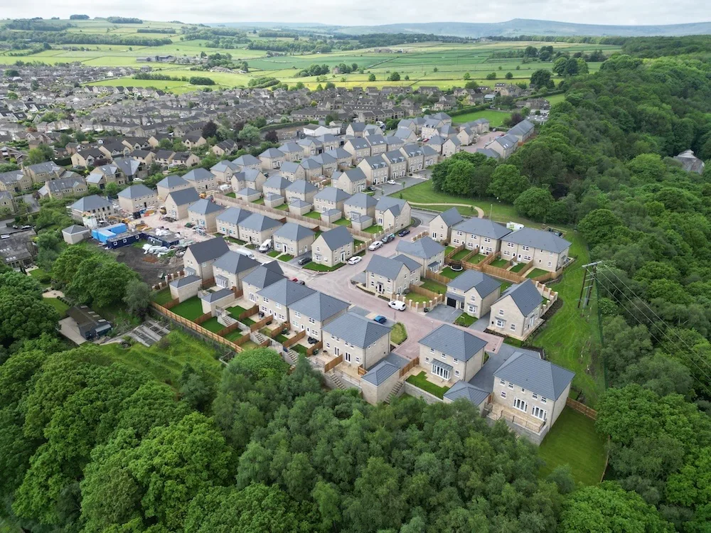 Aerial view of a new stone-built housing development in Yorkshire, with the brickwork laid by Bond Brickwork